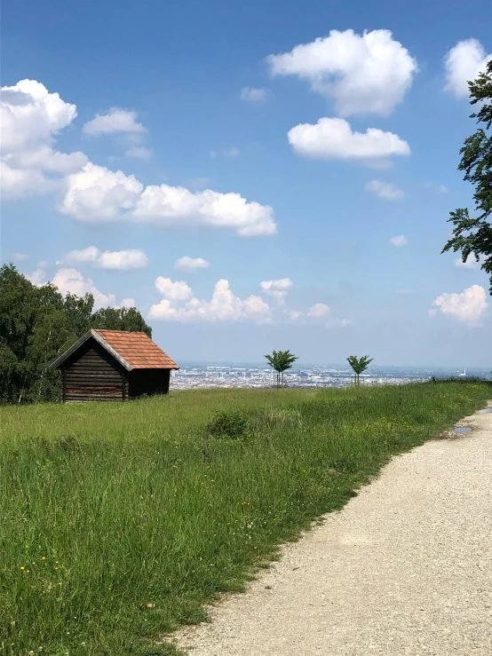 the barn on the far side of the road is empty