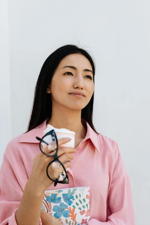 a woman is looking into a pair of glasses