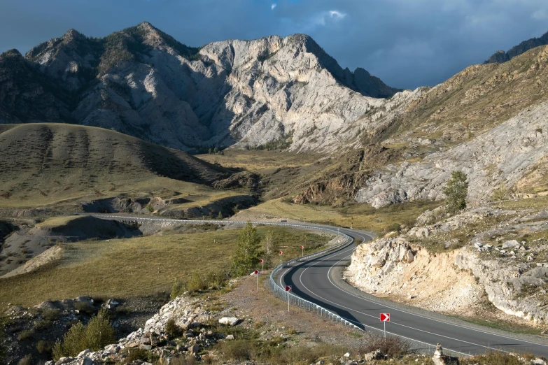 a view of an twisting road from a high altitude point of view