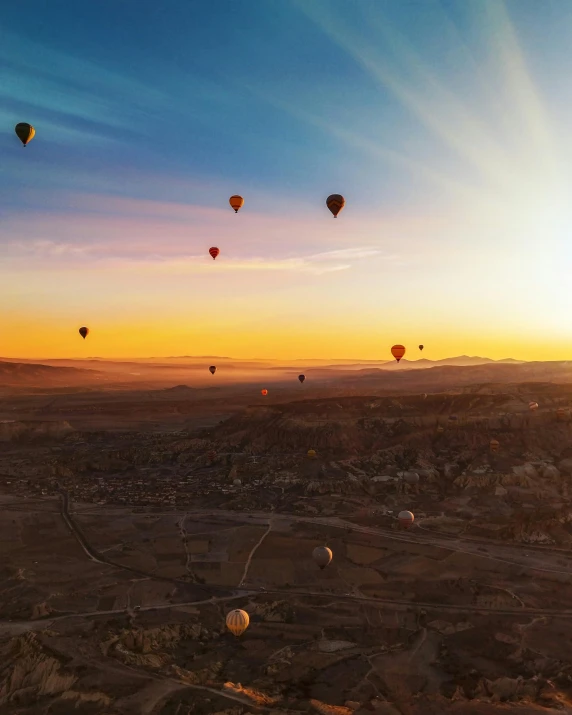 a number of  air balloons in the sky