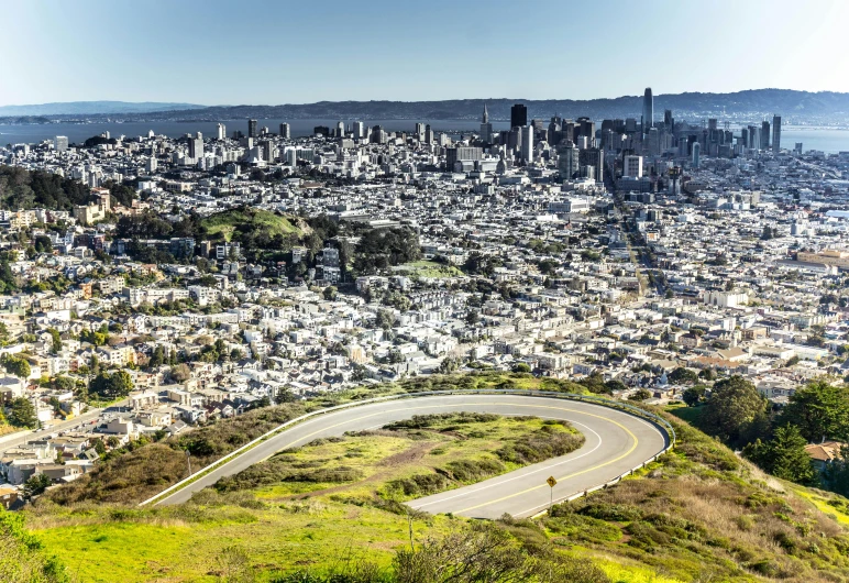 a view of an aerial s of an urban area and road