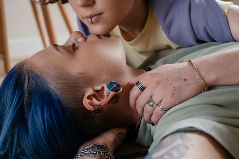 a man and a woman laying on the floor