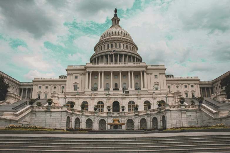 the capitol building with a sky background in washington