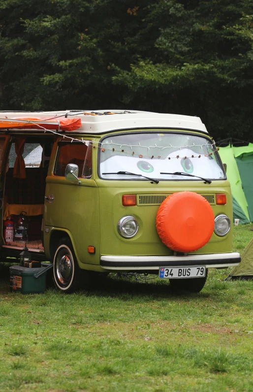 a bus that is parked on the grass