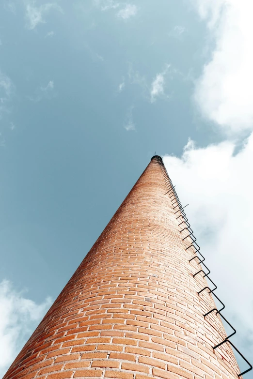 an upward view of a brick building