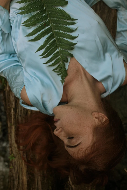 an aerial s shows an oranguira and the skin of the woman