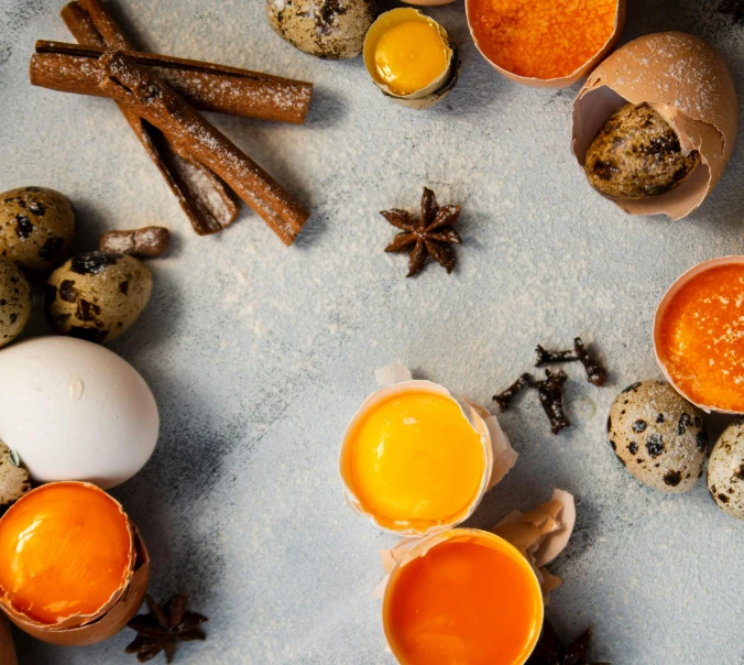 a blue counter with eggs, spices and pretzels