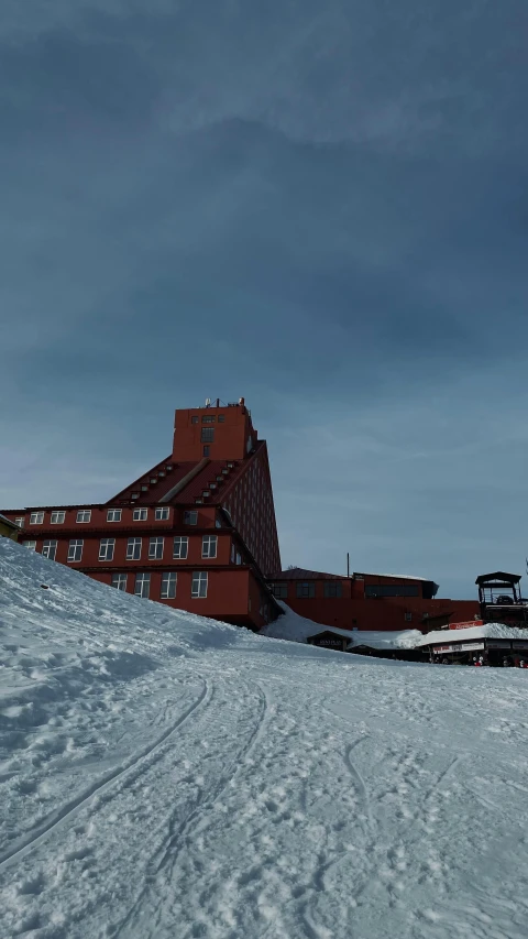 a man is skiing down a snowy hill