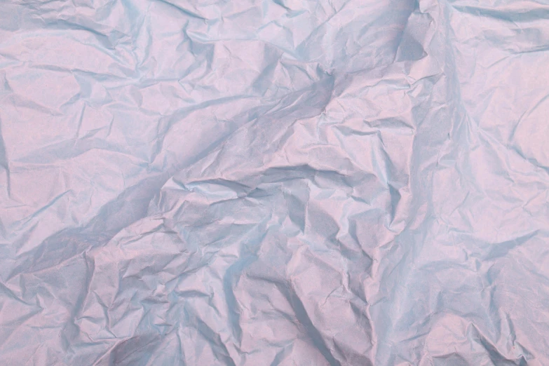 an abstract image of crumpled up blue paper