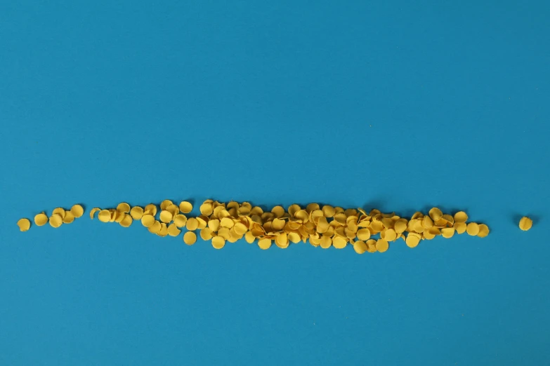 an image of yellow mustard being cut into chunks