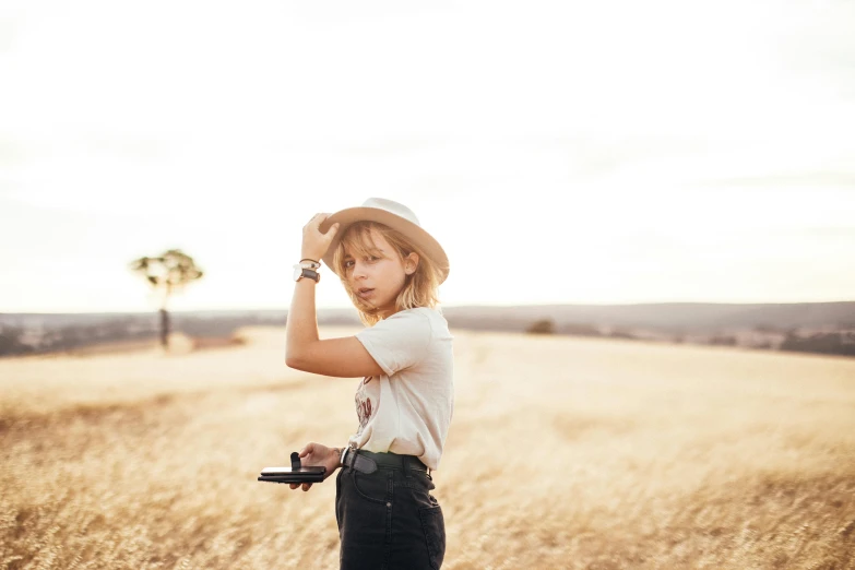 a woman taking a po of herself with a camera