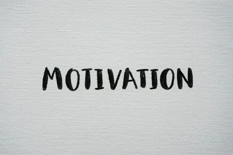 a black and white po with the word motivation written on it