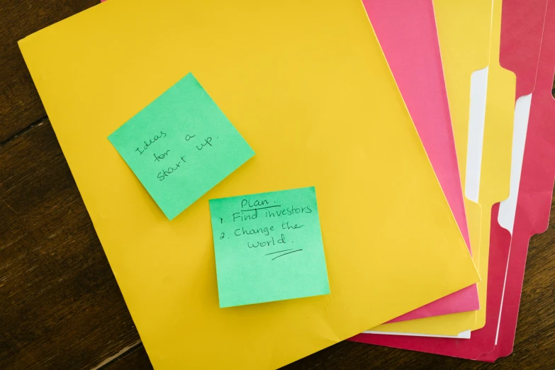 four envelopes with post it notes attached