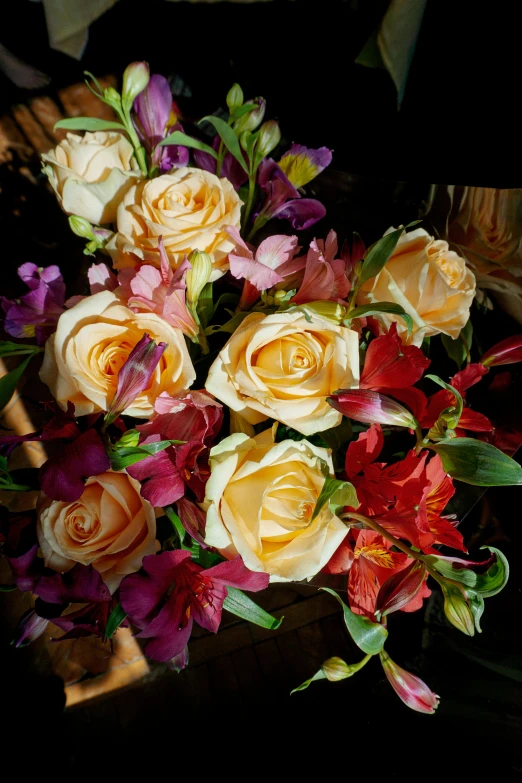 a bouquet of flowers is sitting on the table