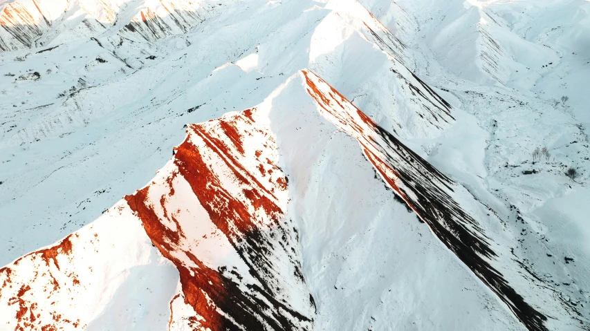 two mountain slopes in the distance covered with snow