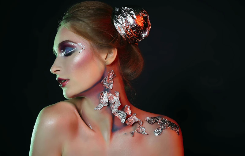 woman wearing a veil with silver leaves on top