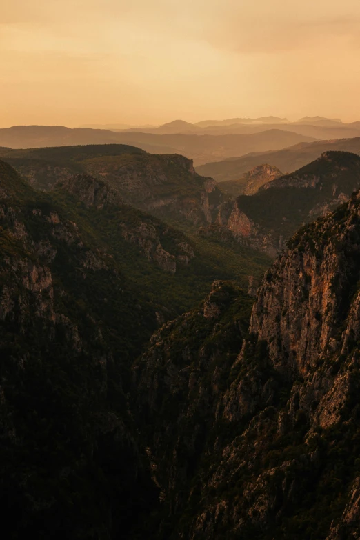 view from the top of a mountain looking down on hills