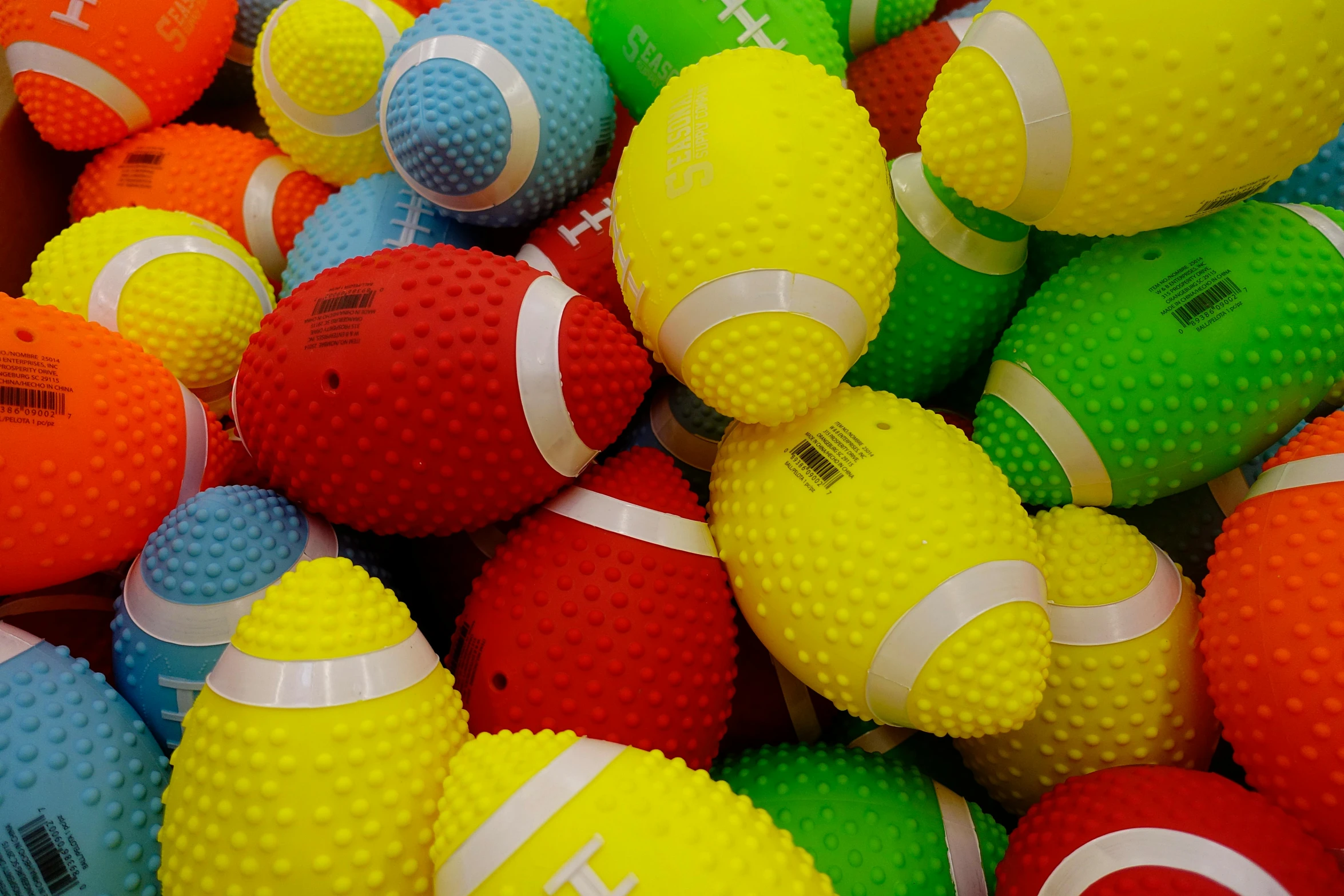 multicolored balls for sale in a market