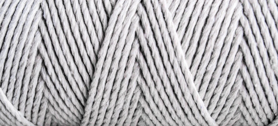 a ball of gray colored thread