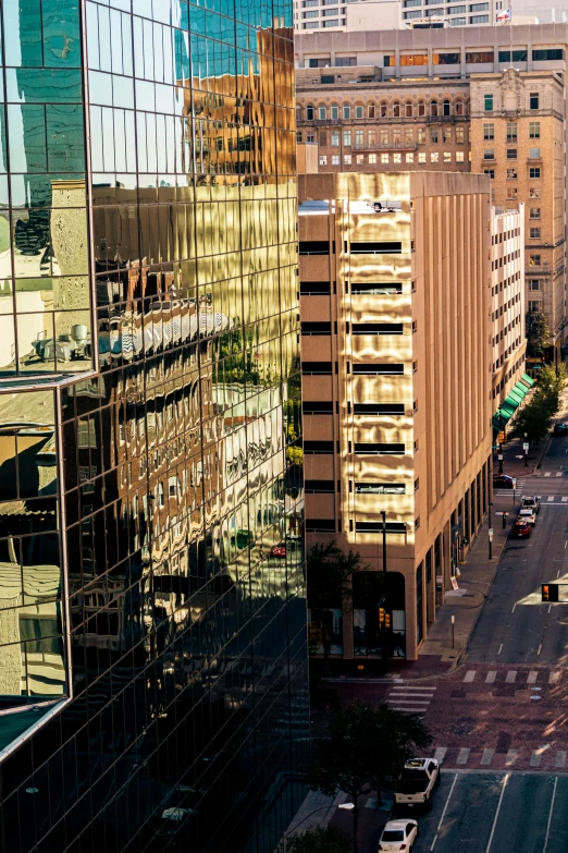 a busy street next to some very tall buildings