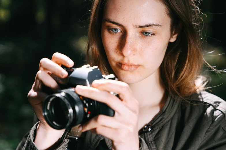 the camera is in use by a woman