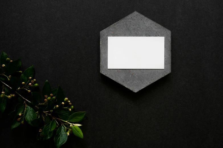 an empty white business card with black and gray designs