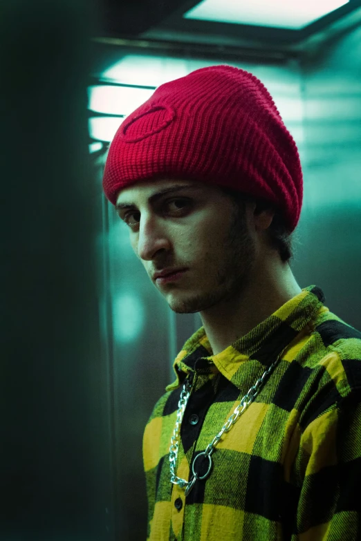 man with beanie looking away from the camera