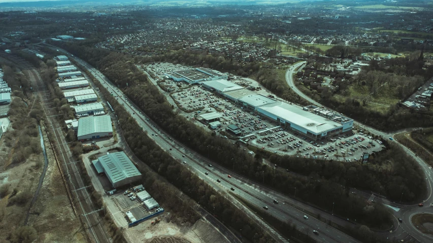 an aerial s of cars parked in a large parking lot