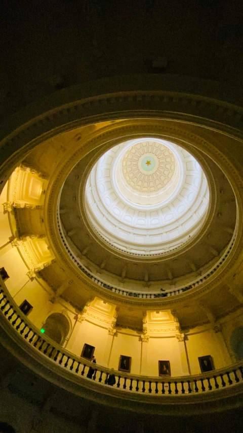 view up at ceiling looking up to a round ceiling