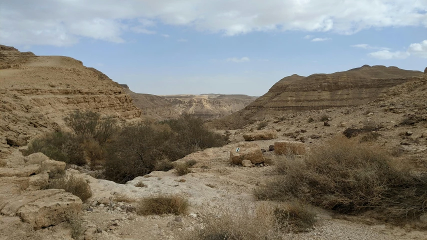 some barren mountains in the desert are shown