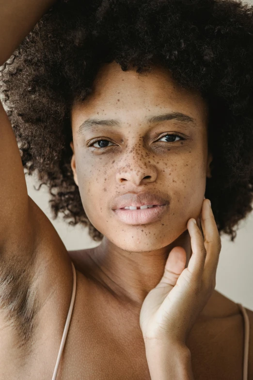 a woman wearing  top with frecking