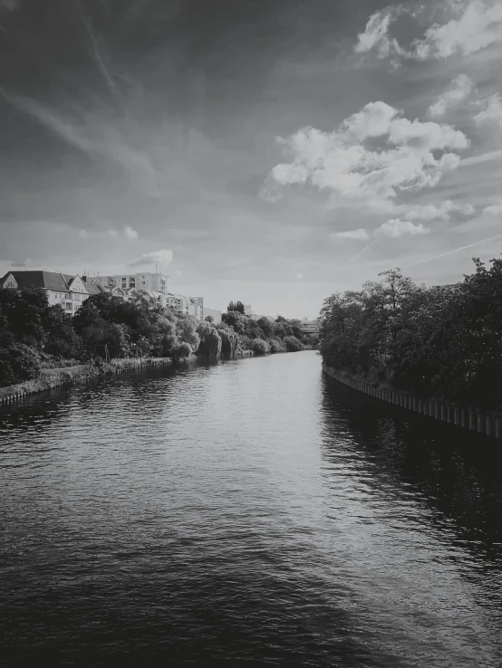 a very long narrow river near some buildings