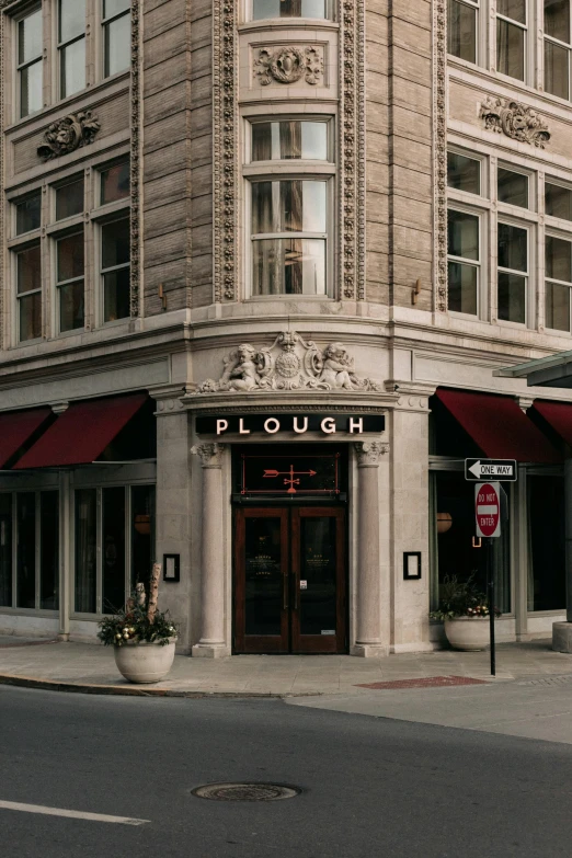 a building with the doors closed by the curb