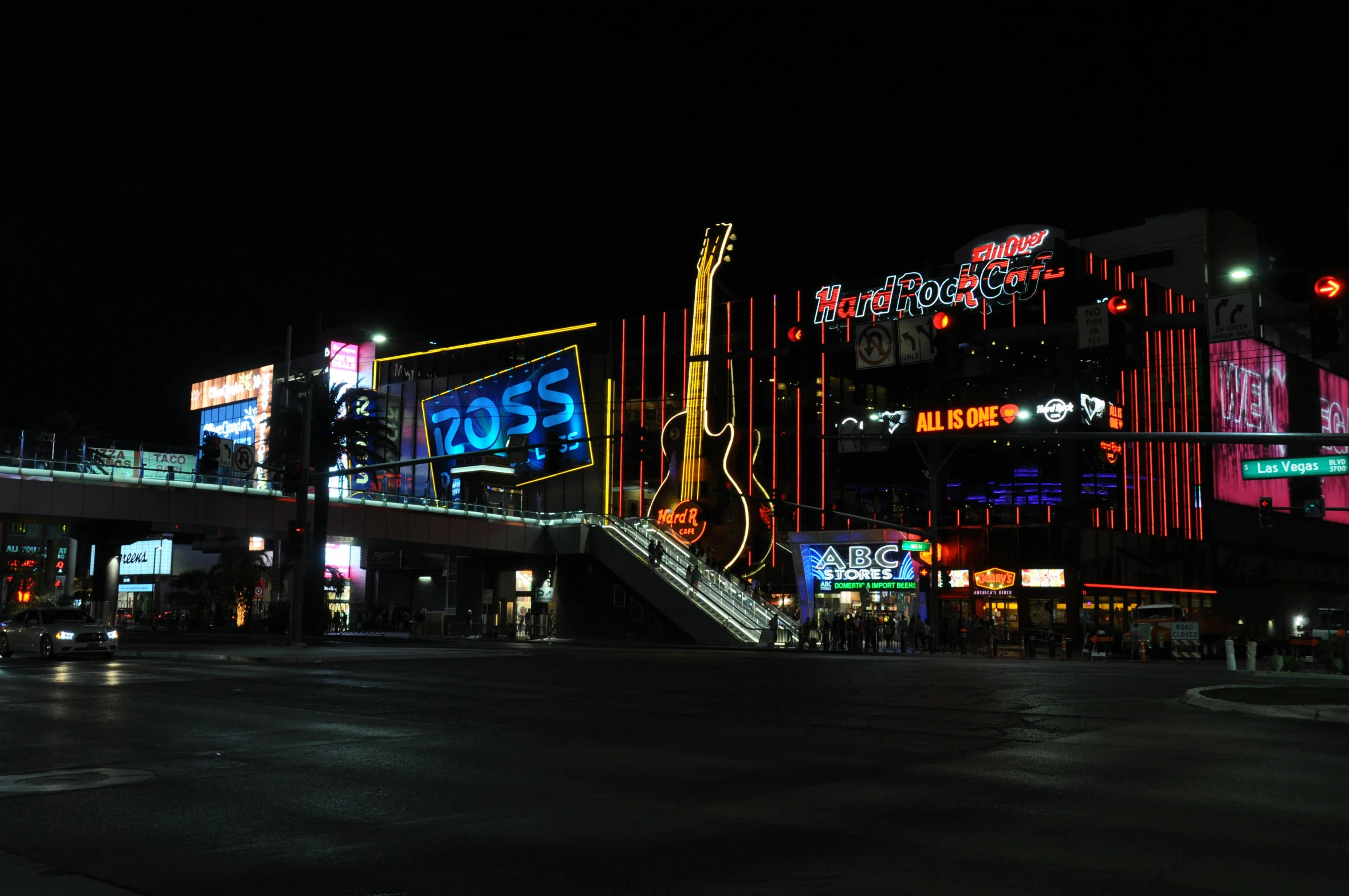 brightly lit buildings in a city at night