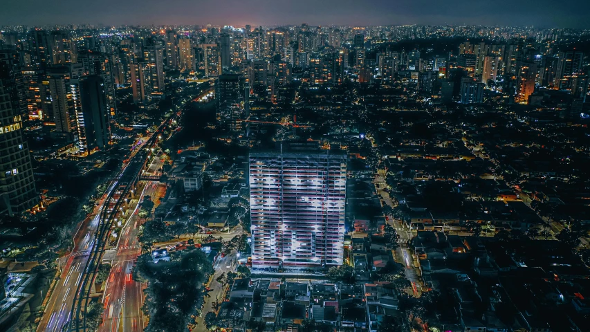 an aerial view of a city at night