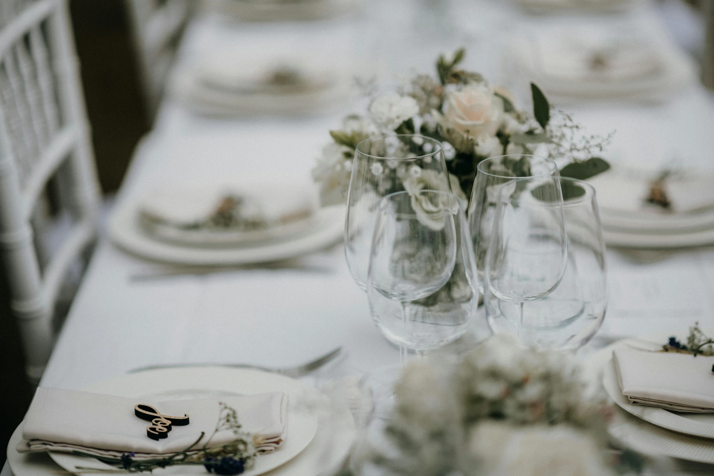 the dining table is set for a fancy dinner