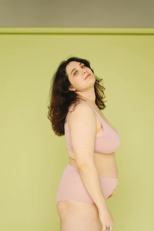 a beautiful woman with large  wearing pink underwear