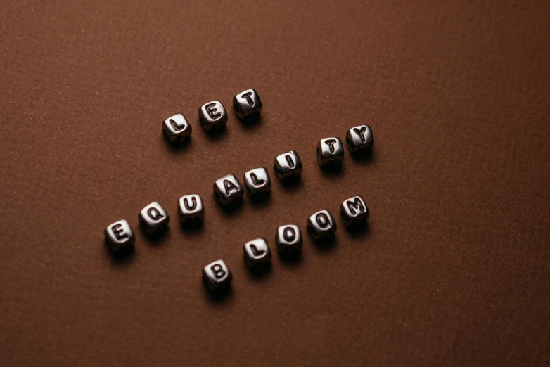 eight black and white dices spelling out a word