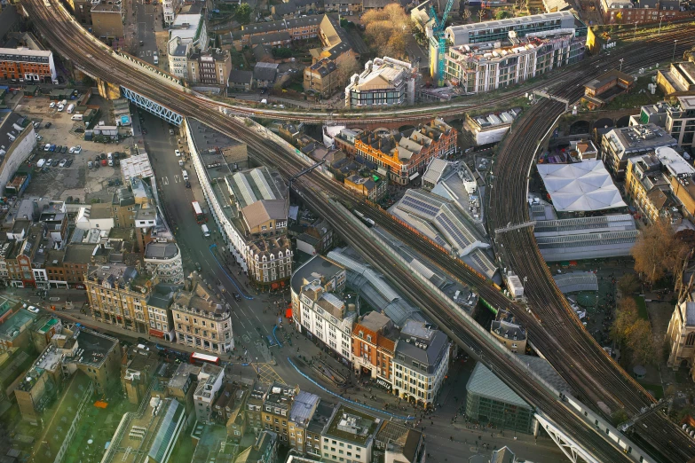 aerial s of multiple railroad tracks and various buildings