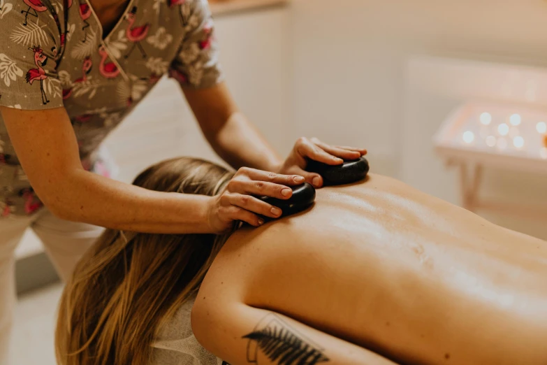 a woman in a beauty salon getting massage