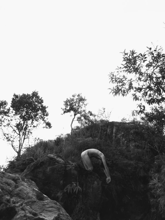 a person who is climbing up a mountain