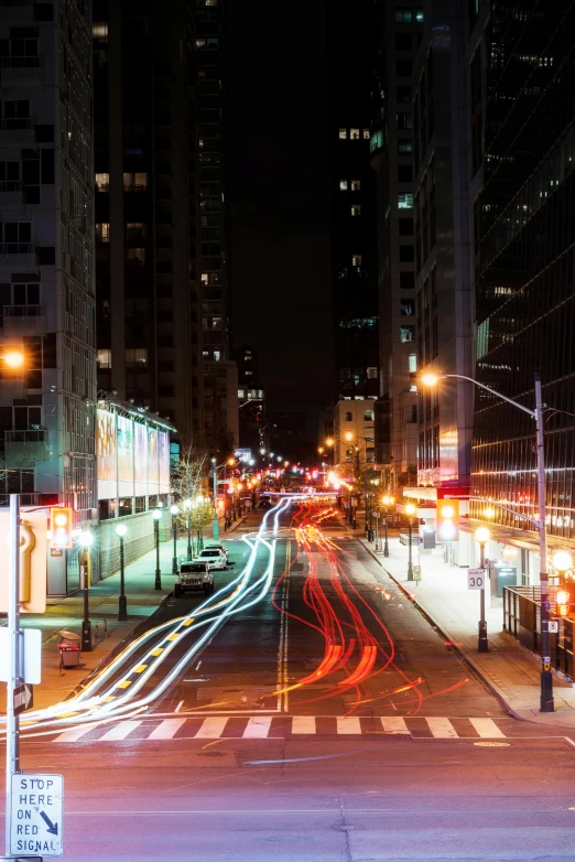 the night view of a busy city street