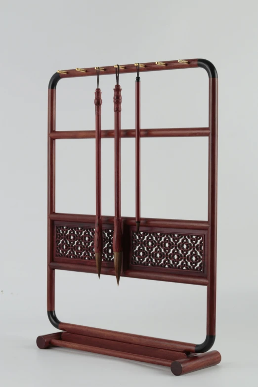 the double - sided wooden room divider is inlaid with a pair of hooks