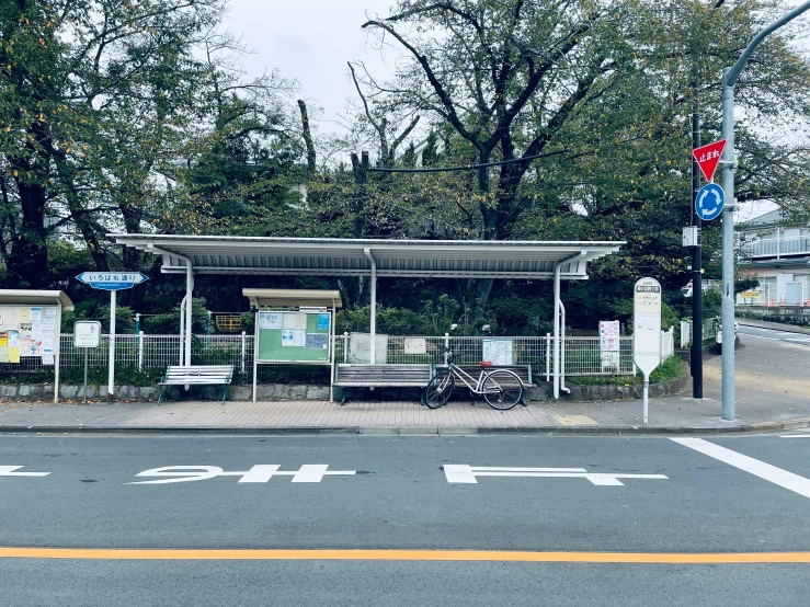 the bus stop is built into the road