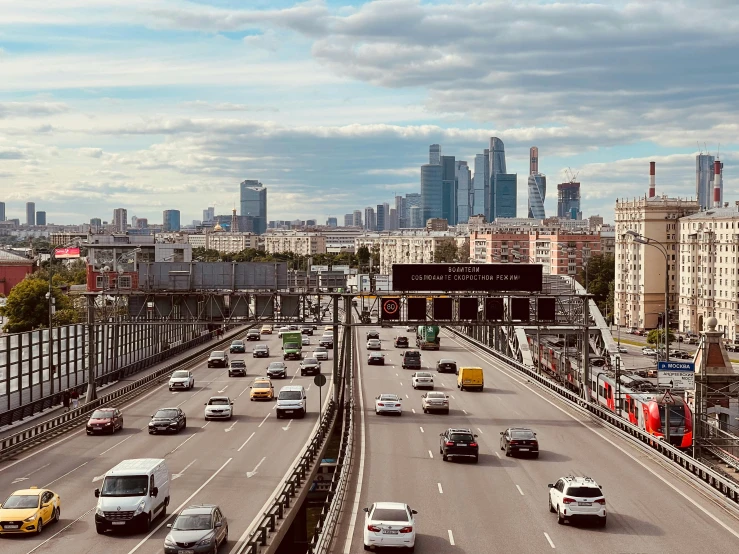 a busy highway with several cars and trucks on it