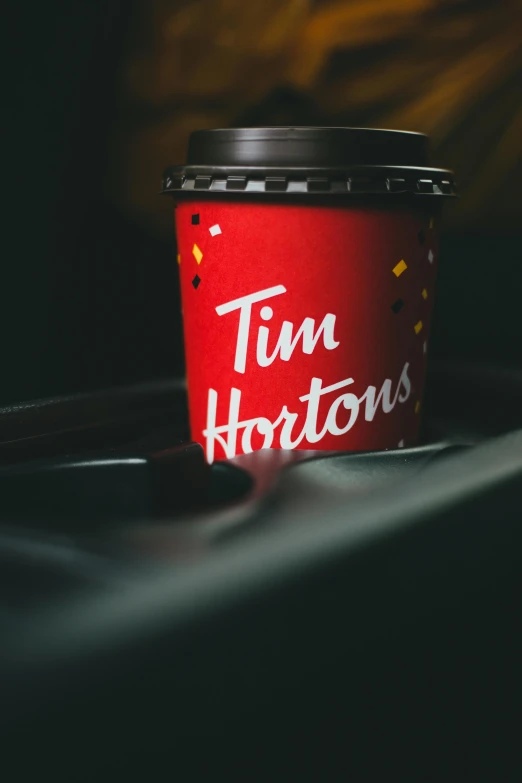 a cup with the word tim hortons on it