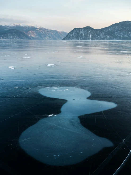 water with a boat floating in the middle of it