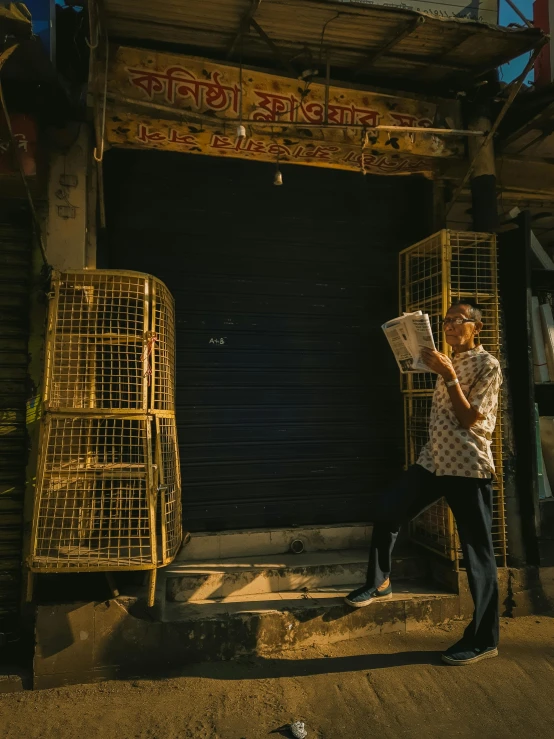 a woman is standing in front of a shop