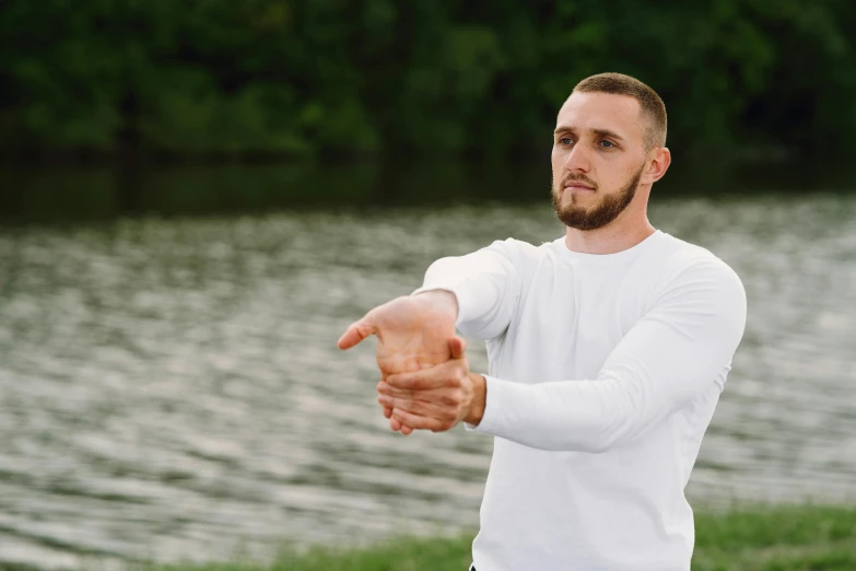 a man pointing at soing with his finger