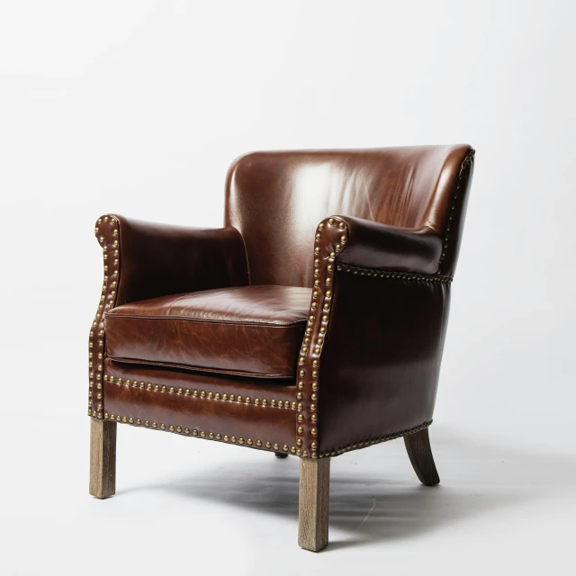 an antique leather chair on a white background